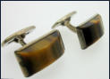 Hopeiset kalvosinnapit,Tiikerinsilm� Design Jalosepot Oy, Lahti Finland, 1957, mitat n. 2cm x 1cm, 75�