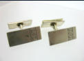 Hopeiset kalvosinnapit, 1965, Design Veljekset Sundqvist , Helsinki Finland 1923- 1999, mitat n. 2,1cm x 0,9cm, 45�